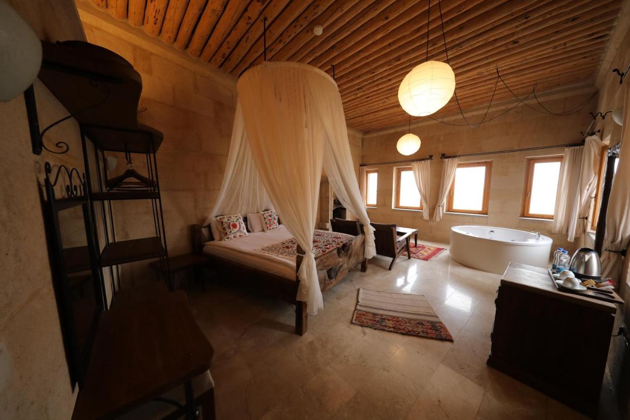 Helike Cave Suites Учисар Экстерьер фото