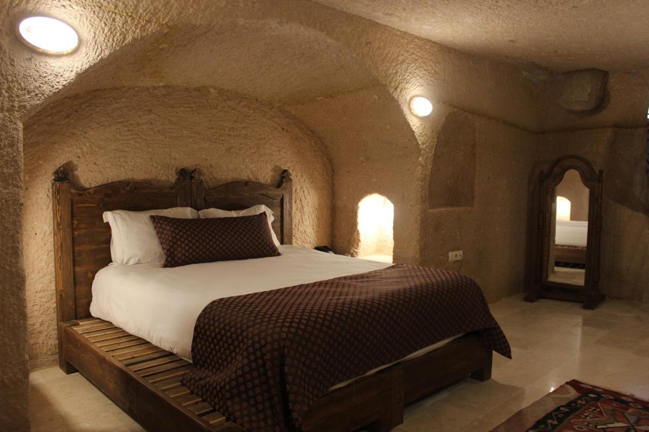 Helike Cave Suites Учисар Экстерьер фото