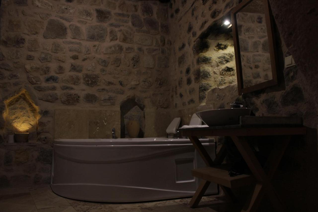 Helike Cave Suites Учисар Экстерьер фото