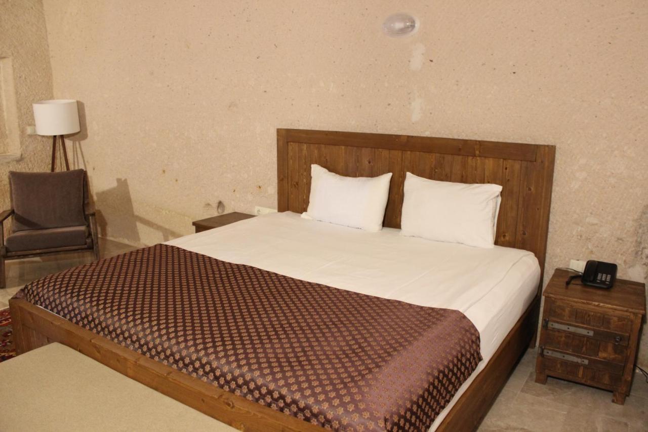 Helike Cave Suites Учисар Экстерьер фото