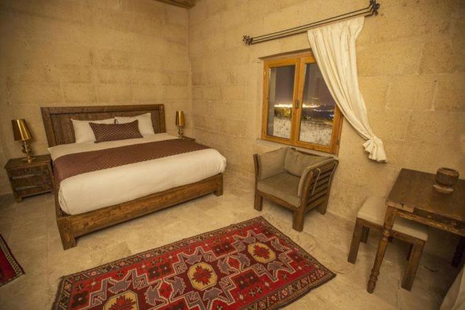 Helike Cave Suites Учисар Экстерьер фото