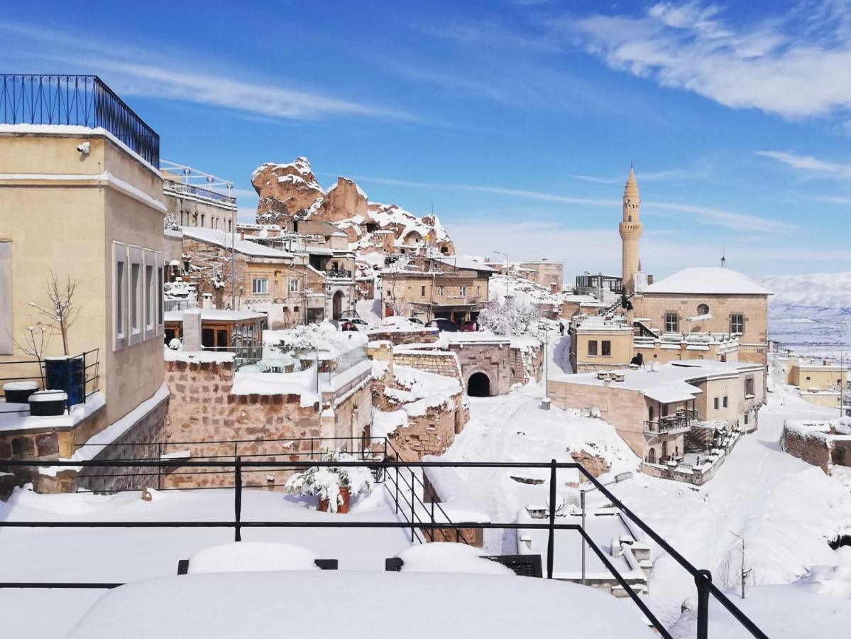 Helike Cave Suites Учисар Экстерьер фото